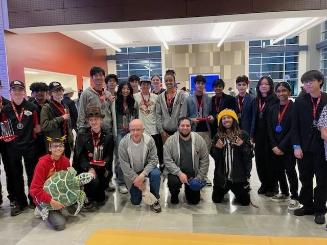Team members at robotics tournament