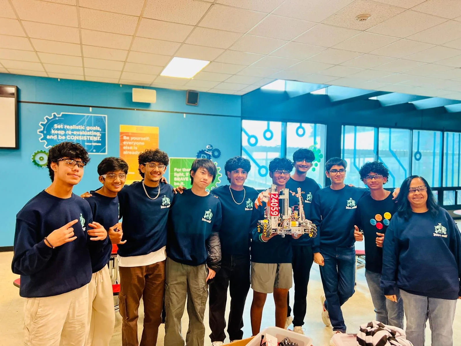 Dynamic Darts robotics students together at a competition